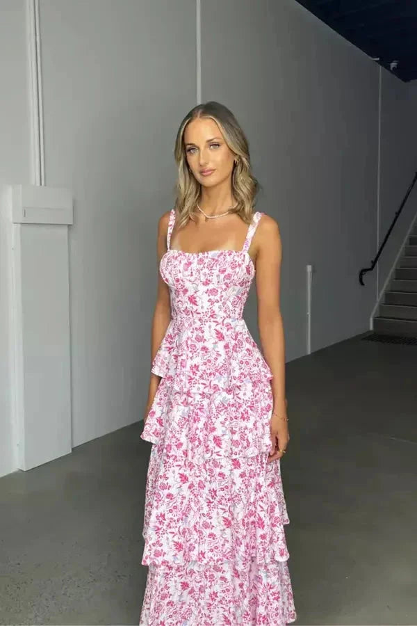 Pink strapless dress with three-tier floral design in Stormy, perfect for special occasions.
