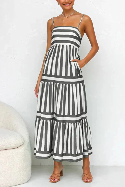 Adaly tiered maxi dress in navy with strappy top, made of eco-friendly cotton blend, flowing and elegant for summer style.