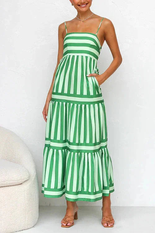 Strappy top tiered maxi dress in Adaly design, showcasing a flowy silhouette with adjustable straps in a soft, breathable…