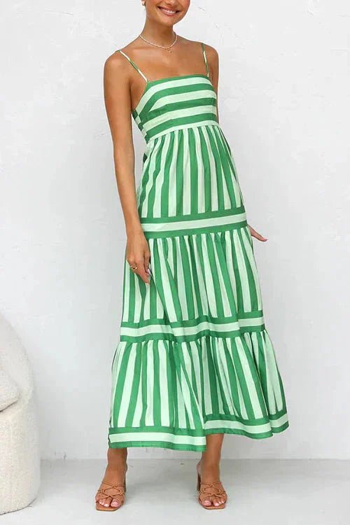 "Adaly tiered maxi dress in Green, featuring a strappy top design. Made from lightweight flowy fabric for a breezy summer…