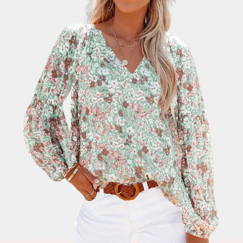 V-neck patterned blouse with bell sleeves in Vegetables, constructed from lightweight and breathable fabric, featuring a…