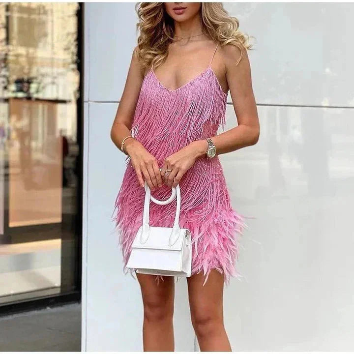 Pink Susan cocktail dress with sparkling fringe, modern cut, perfect for special occasions.