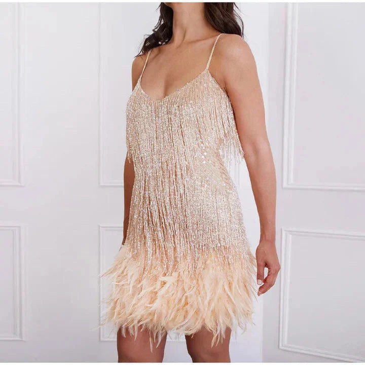 Pinkgold Susan cocktail dress featuring sparkling fringe and modern cut design.