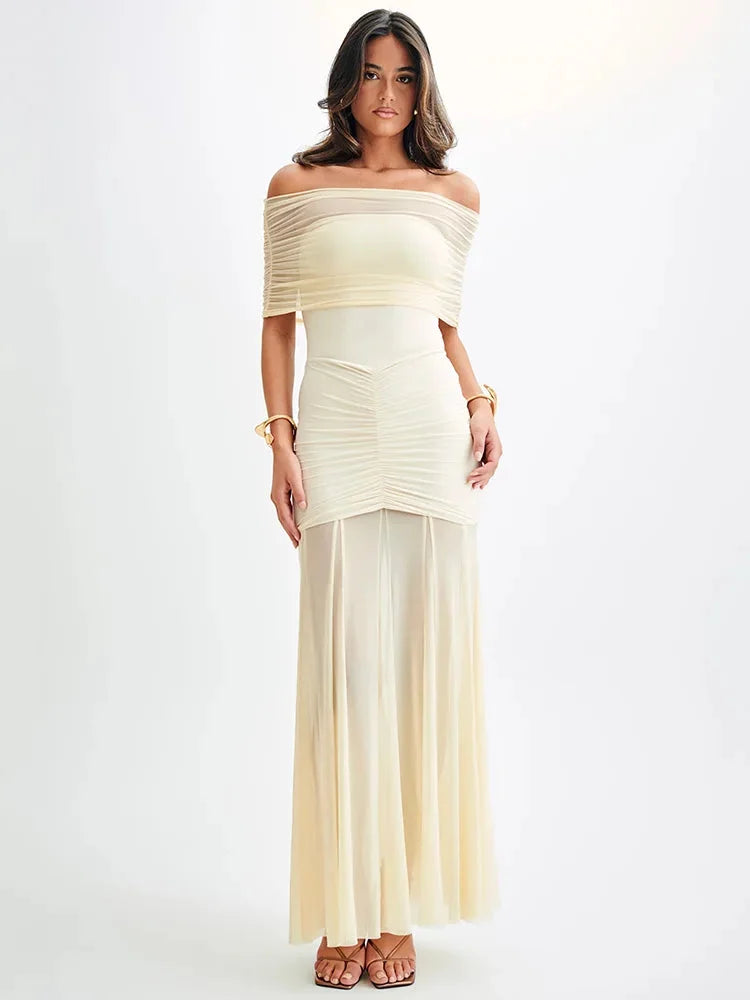 Off-shoulder maxi dress in Stefanie, featuring ruched bodice. Made with soft flowing fabric in a vibrant design perfect for…