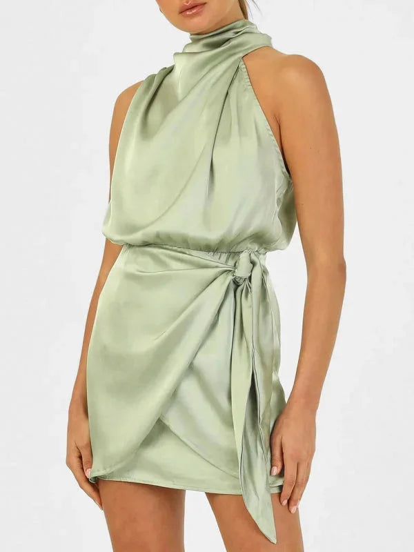 "Lake mini dress featuring a sophisticated cowl neck design in a sleek and trendy fabric."