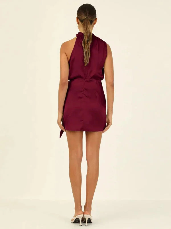 "Lake mini dress in charcoal gray, featuring a stylish cowl neck design, perfect for chic evenings out."
