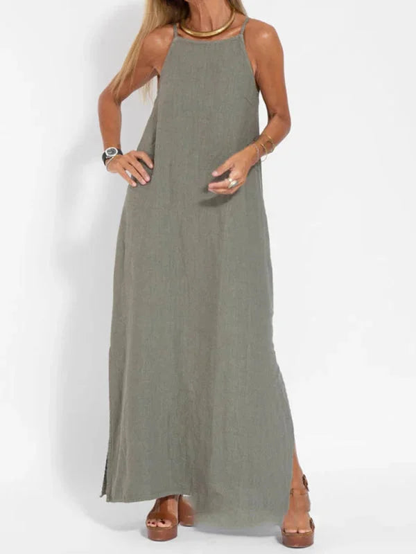 "Reece sleeveless maxi dress in flowing silhouette, made of lightweight and airy fabric, perfect for casual or formal…
