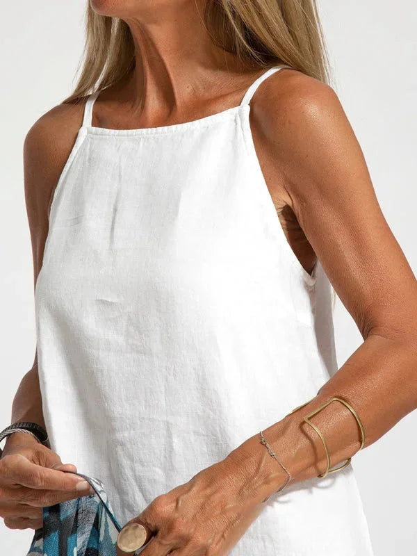 "Reece sleeveless maxi dress featuring a flowing silhouette, made of lightweight, breathable fabric perfect for casual or…