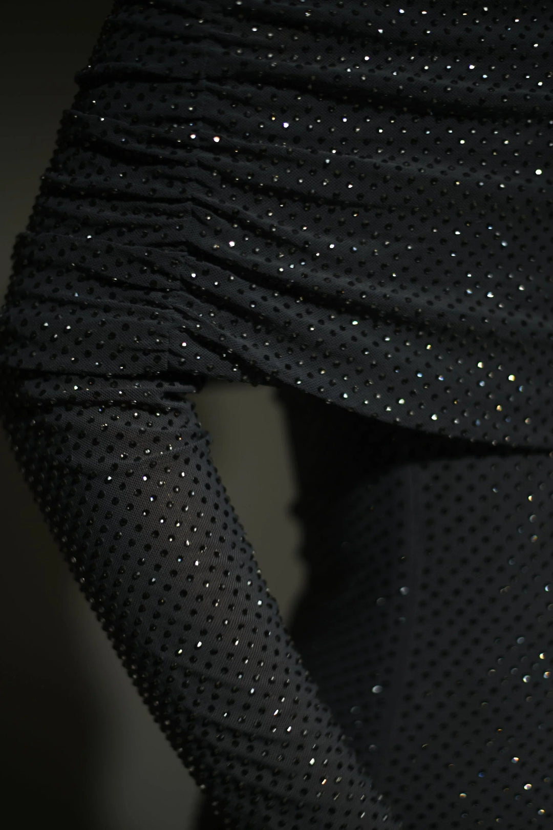 Shimmery Stormy long dress with unique shoulder details, perfect for formal events or special occasions.