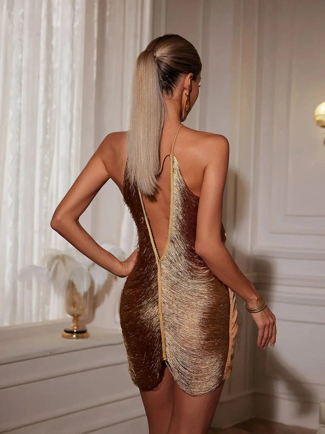Asymmetric zip metallic dress in shimmering Stormy material with unique design detail.