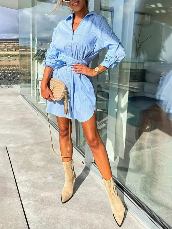 Kenlee shirt dress in silky fabric with belted waist and adjustable sleeves, versatile for all occasions.