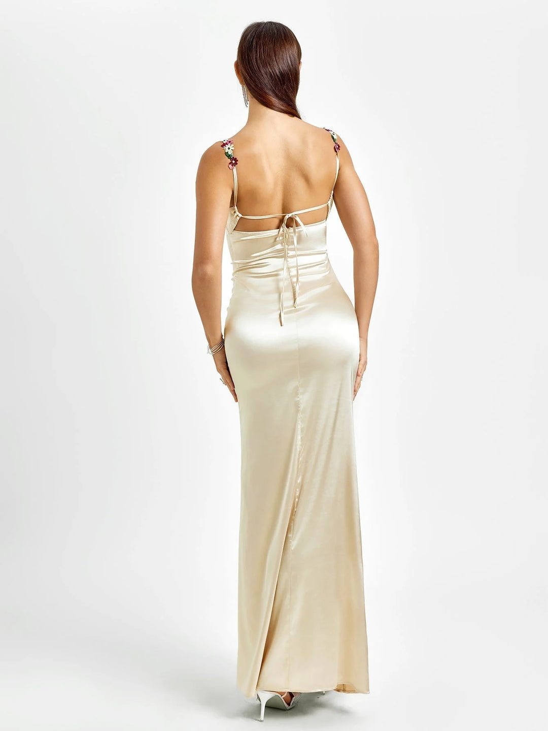 "Sleeveless fitted maxi dress adorned with embellishments for a polished look. Made with high-quality materials for all-day…