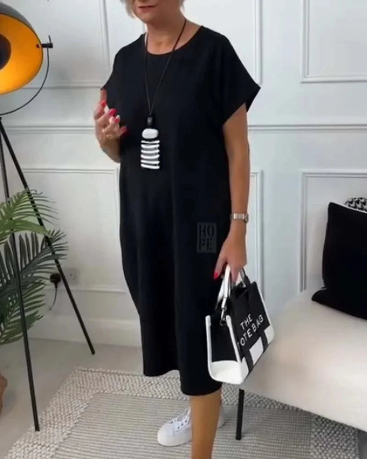 Alt text: "Kassandra dress made from soft jersey fabric in a figure-flattering silhouette, ideal for all-day comfort and…