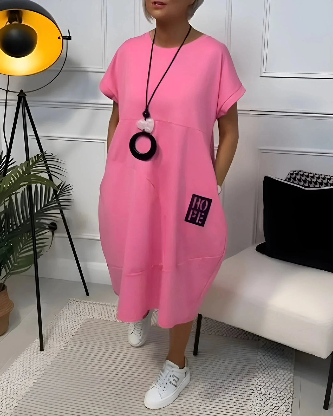 Pink dress with a stylish, comfortable fit by Kassandra. Features a soft, breathable fabric with a flattering design.