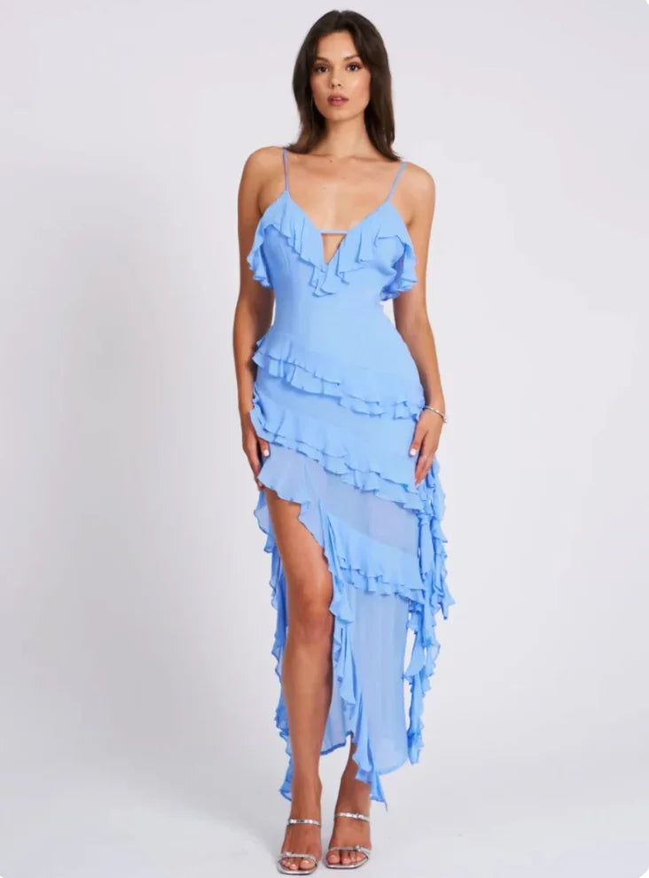 Sleeveless blue dress featuring ruffles, ideal for summer days with a comfortable fit and stylish design.