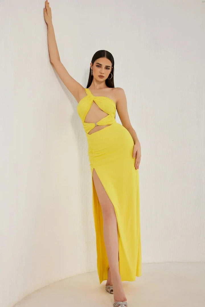 Yellow one-shoulder dress with side cut-out. Made of soft cotton blend fabric. Chic and modern design for a trendy look.