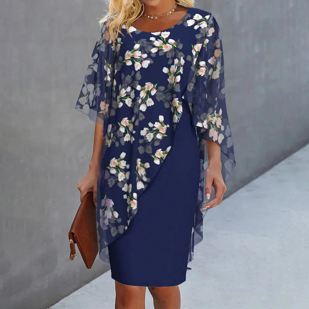 Sheer floral overlay shift dress in Leticia, highlighting delicate floral pattern and airy sheer fabric perfect for a casual…