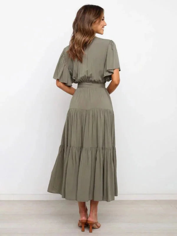 Kaleigha tiered midi dress in chambray fabric with waist belt and button-front detail.