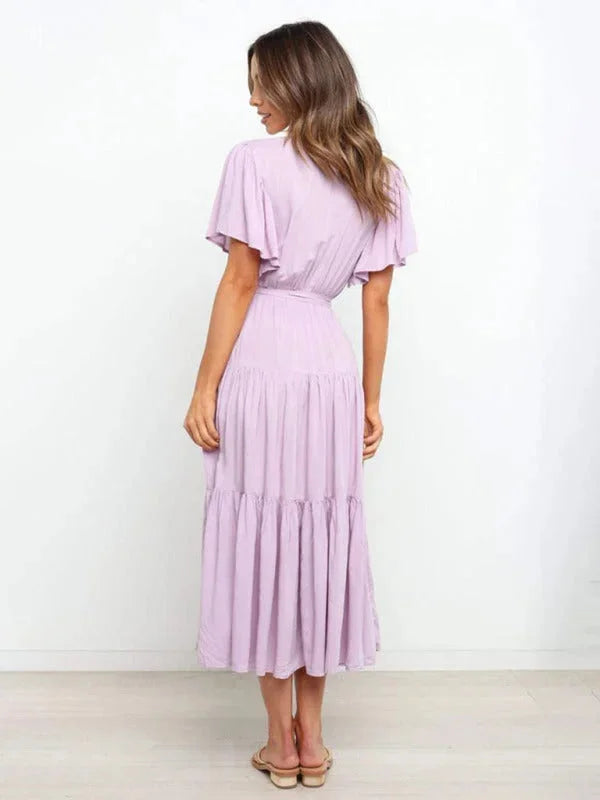 "Kaleigha tiered midi dress in soft cotton blend with belt, featuring a classic silhouette perfect for versatile styling."