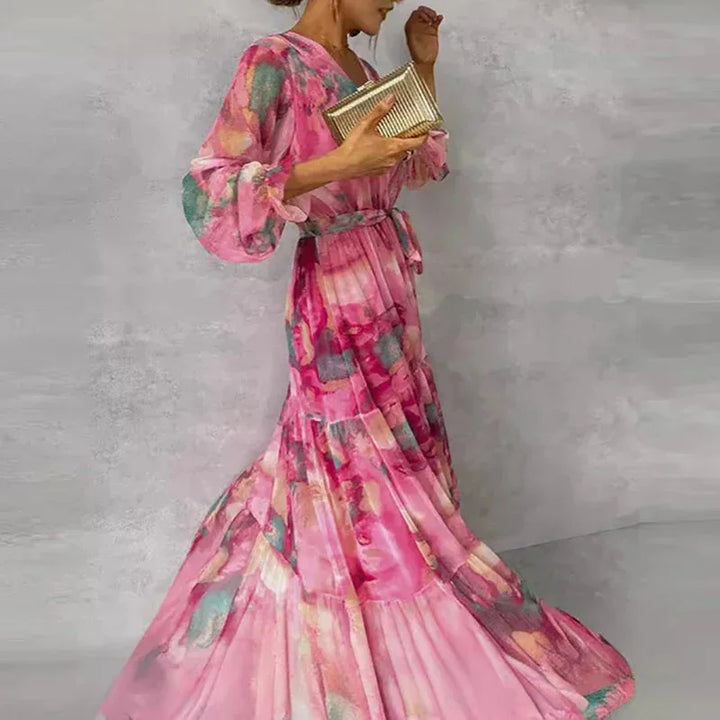 "Haya - Women's pink printed long sleeve maxi dress with a floral pattern on flowing fabric"
