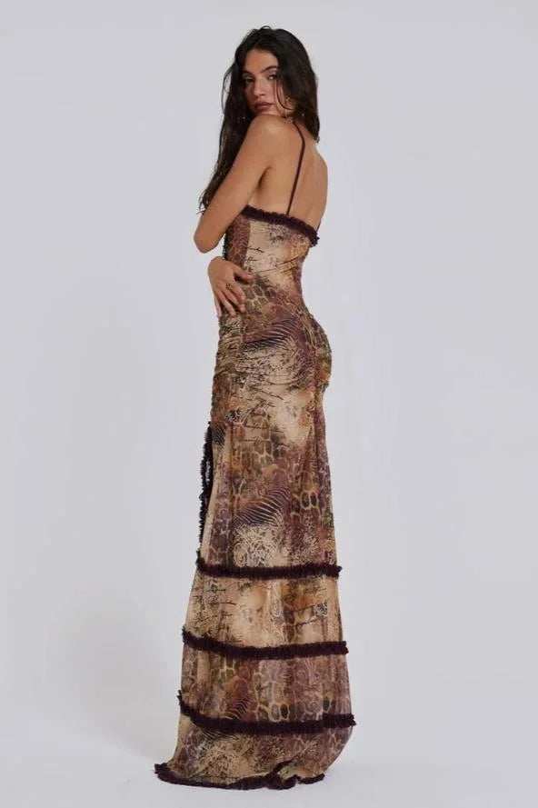 "Marie deep V-neck maxi dress with draped trim in soft flowing fabric, perfect for elegant occasions."
