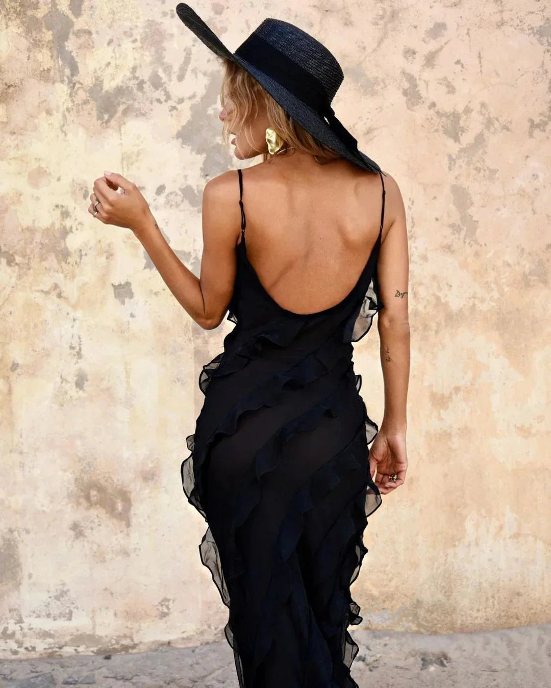 Briar maxi dress with elegant ruffles, perfect for evening events, in flowing chiffon fabric with a flattering silhouette.