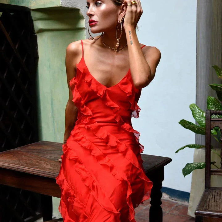 "Briar elegant ruffled maxi dress with flowing fabric design, perfect for evening events"