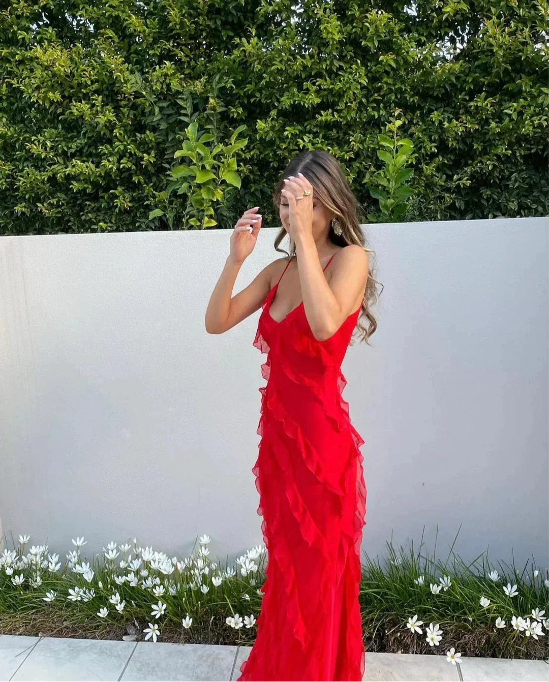 "Briar ruffled maxi dress in black for evening events, featuring a flowy design with subtle ruffles and a sophisticated…