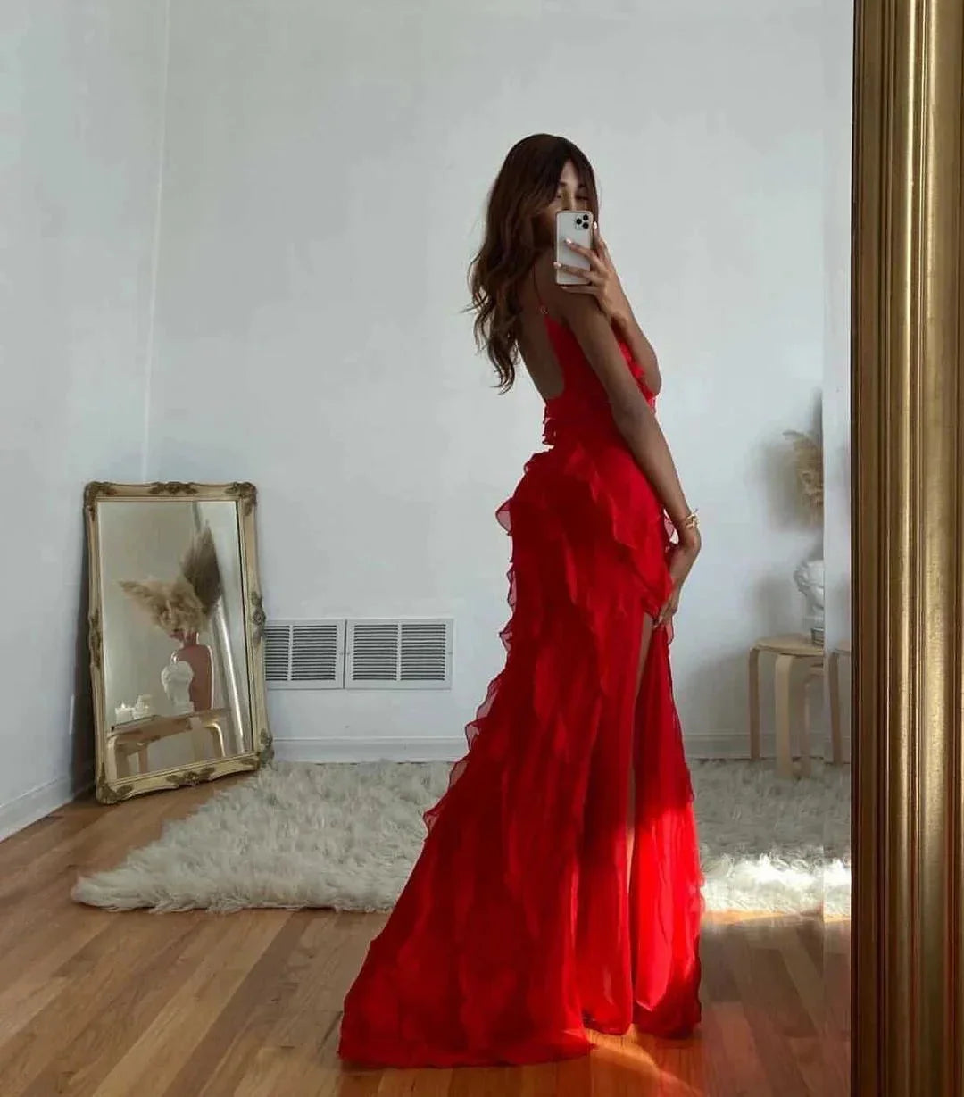 Briar ruffled maxi dress in elegant design for evening events, with flowing silhouette and delicate ruffles at the hem.