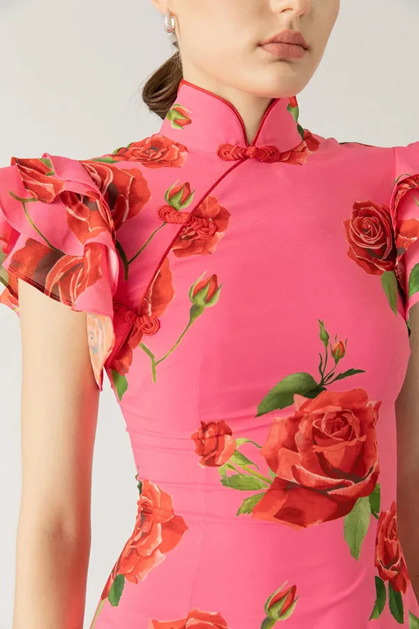Pink floral maxi dress with high neckline, ruffled sleeves. Features a Avanna floral print on soft chiffon fabric.