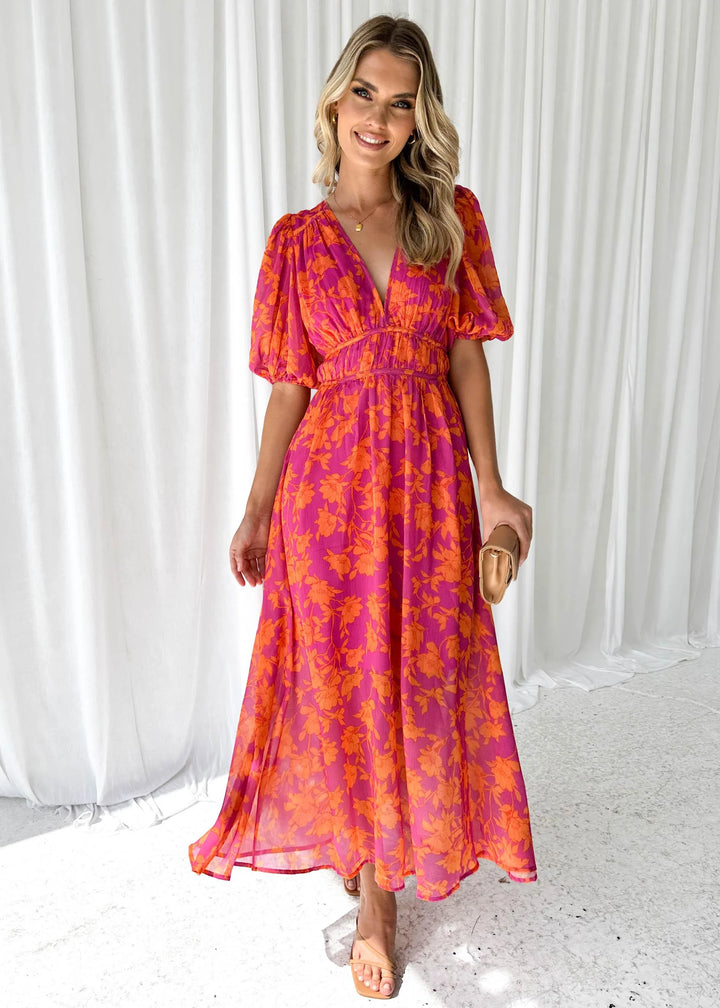 Bright pink floral maxi dress with a gorgeous Manal pattern design, made of lightweight breathable fabric.