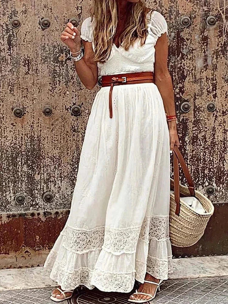 "Kaitlin V-neck belted lace maxi dress in navy blue with floral pattern and elbow sleeves, perfect for special occasions."