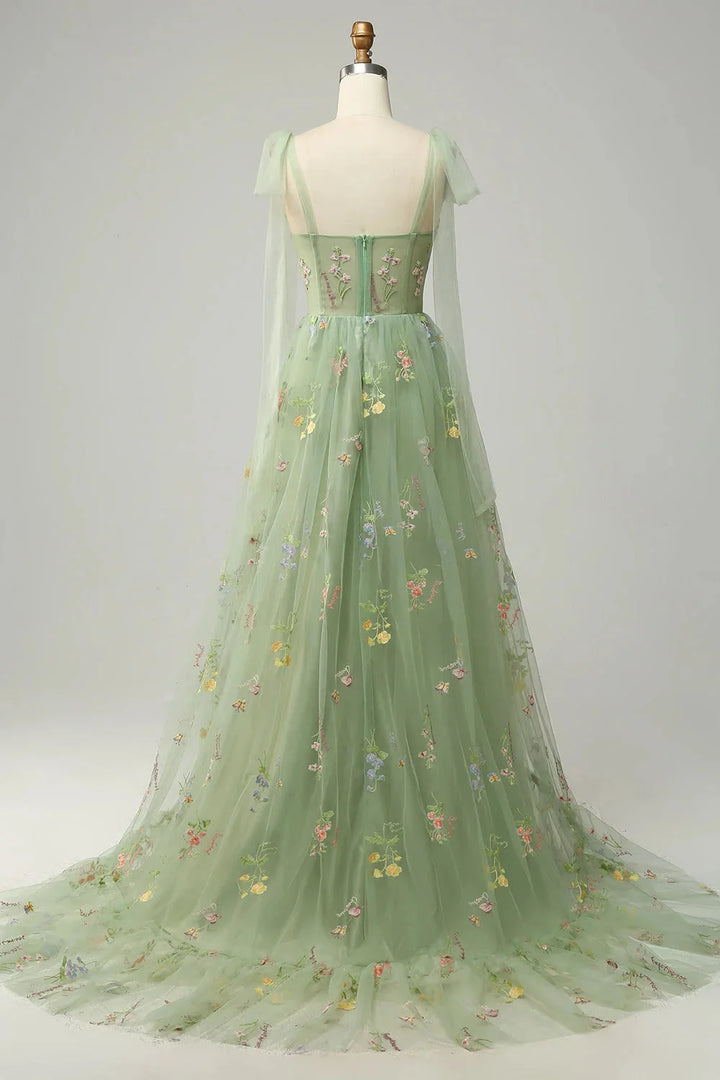 "Bianca embroidered tulle dress featuring sheer overlay, delicate floral embroidery, and elegant design"