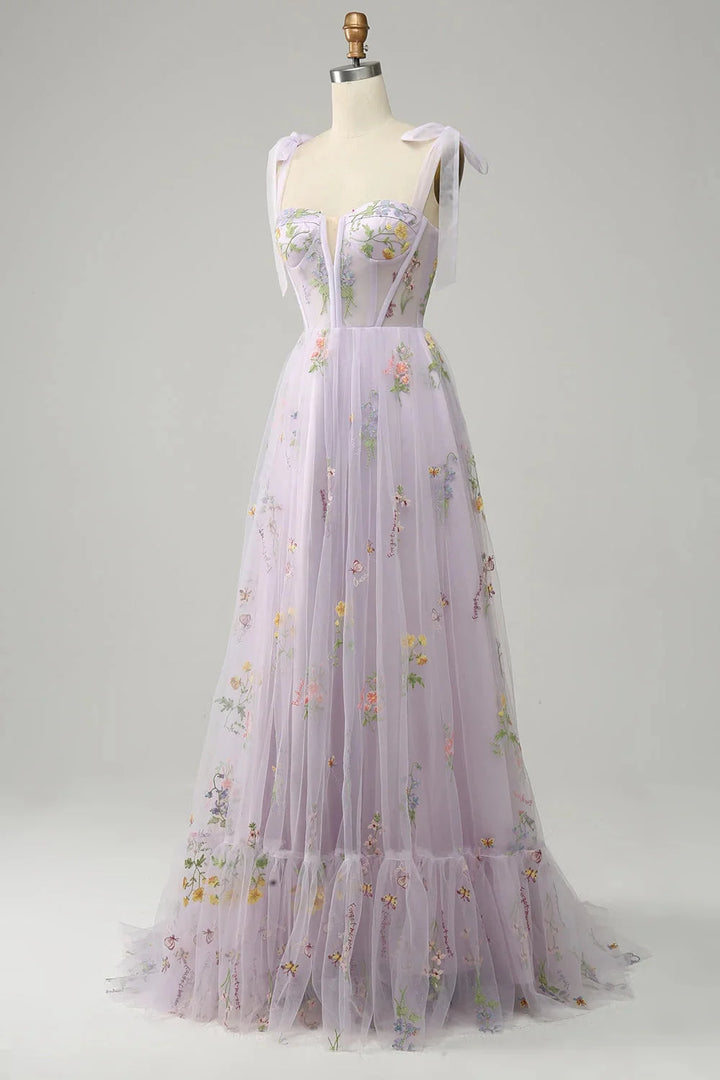 "Bianca tulle dress with sheer overlay, delicate embroidery, perfect for special occasions"