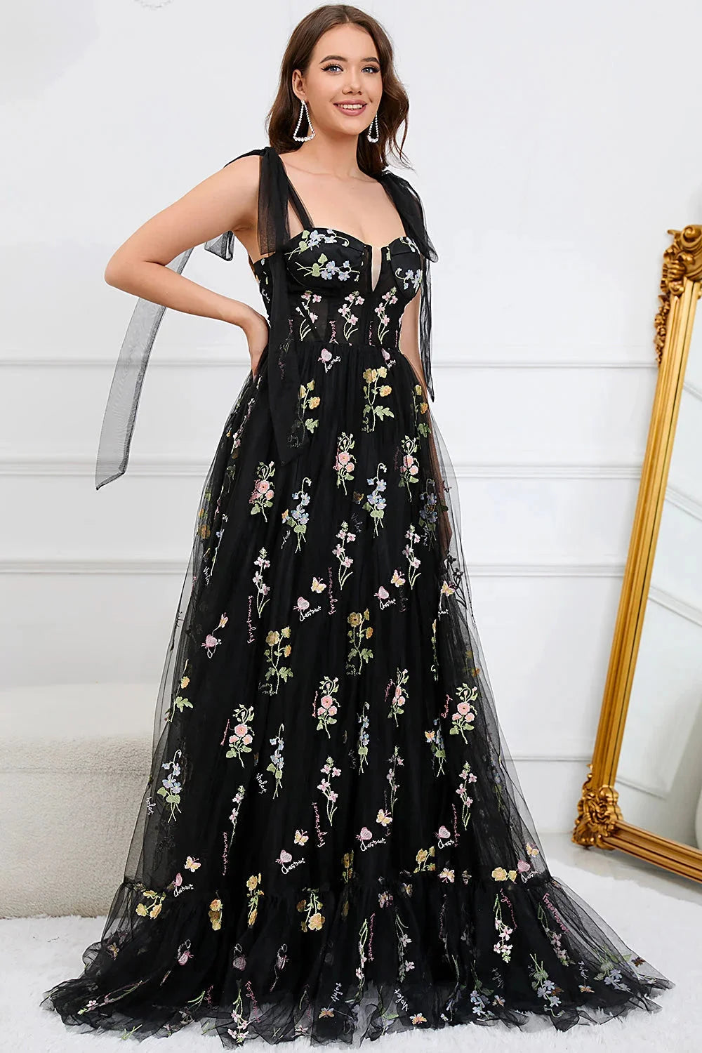 "Bianca tulle dress featuring exquisite embroidery and sheer overlay for a chic look"