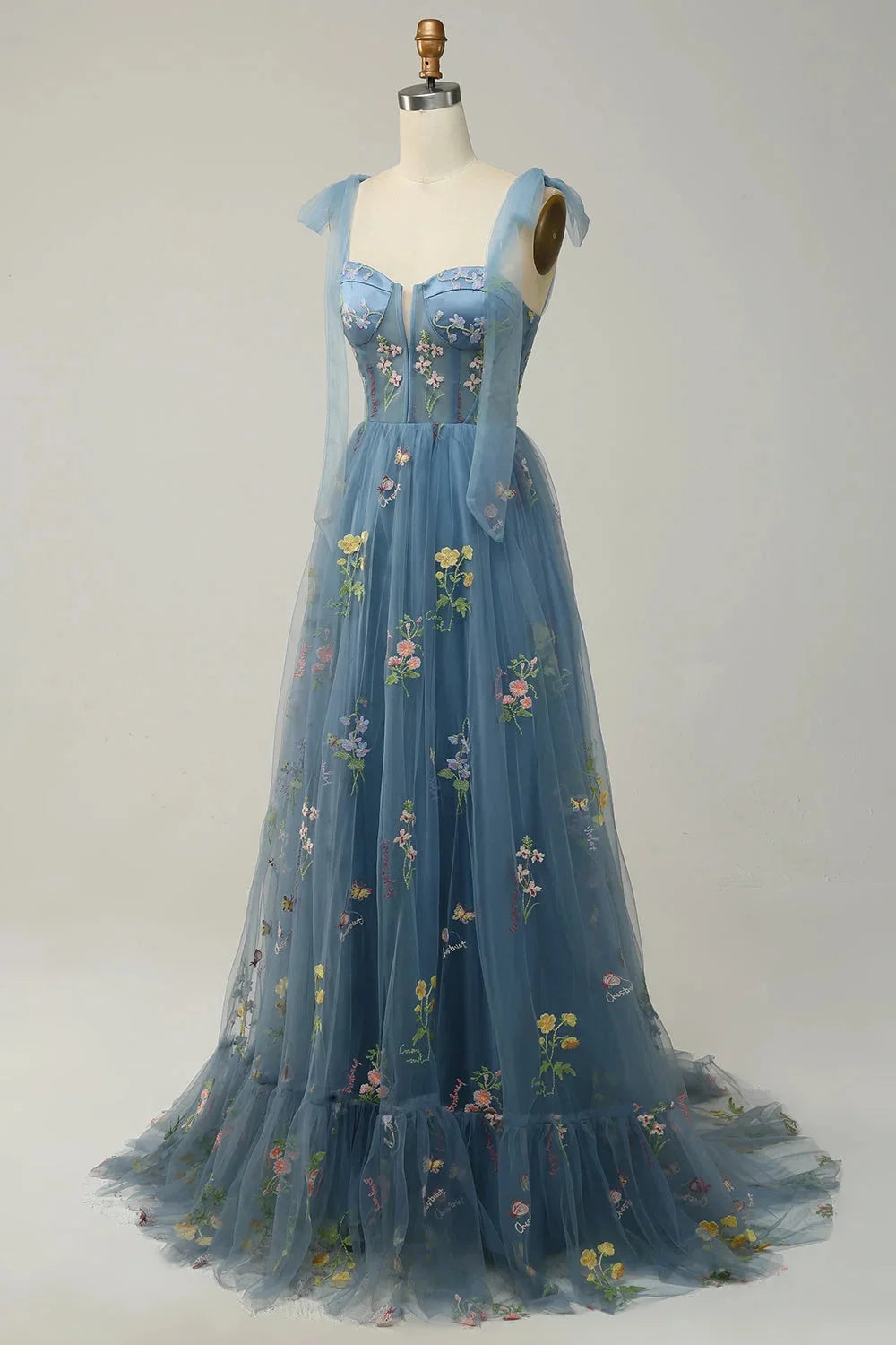 "Bianca dress: Elegant embroidered tulle with sheer overlay, perfect for special occasions. Feminine and sophisticated…