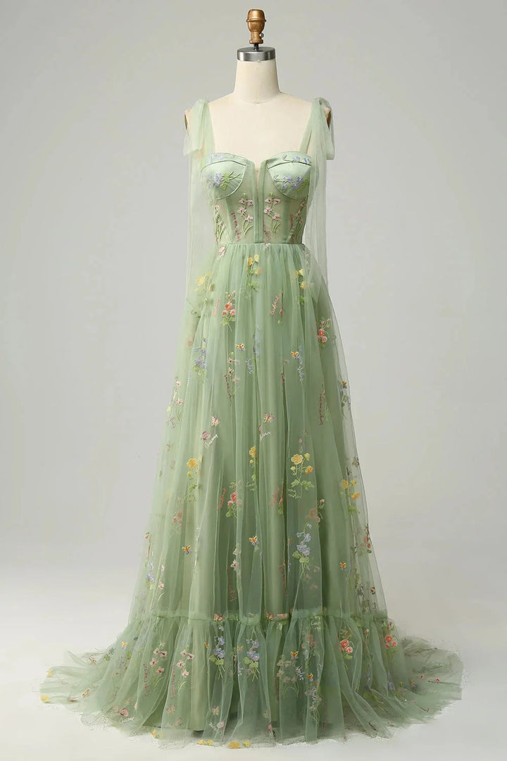 Green Bianca tulle dress with embroidered details, sheer overlay, and a flattering silhouette perfect for special occasions.