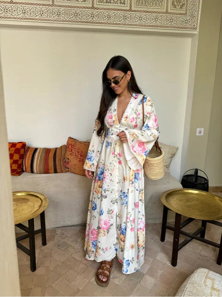 "Eiley long sleeve boho dress with floral pattern, made from soft, flowy fabric. Perfect for a casual yet elegant look."