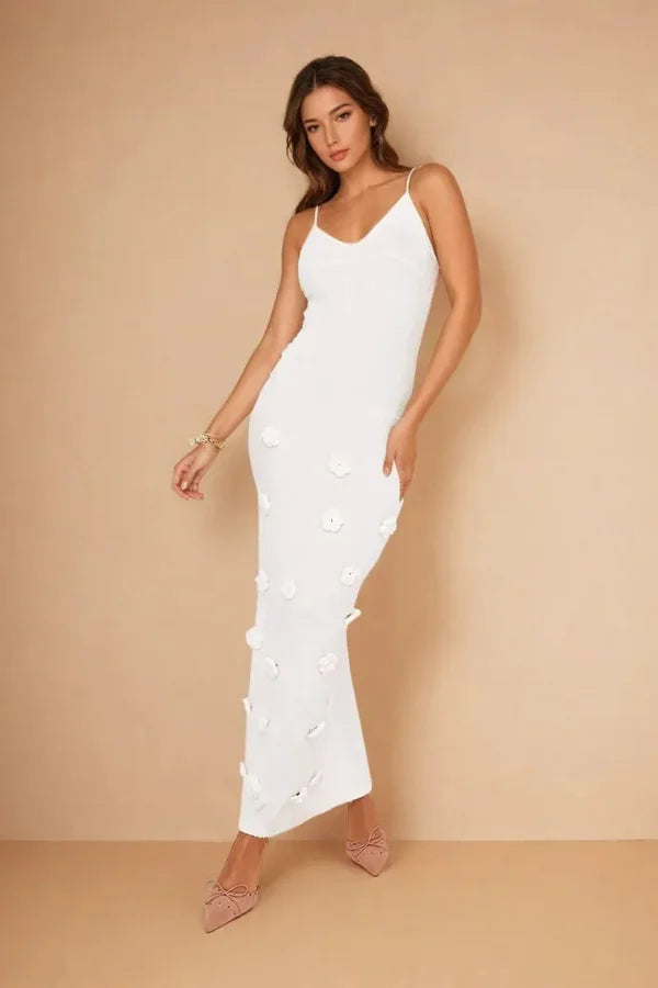 "Eleonor maxi dress featuring intricate floral appliqué design, ideal for a casual yet stylish look for women."