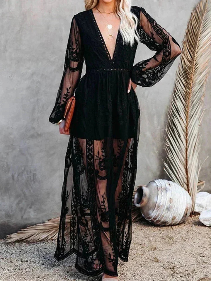 Sheer lace maxi dress with long sleeves, showcasing graceful design and ethereal elegance by Zephyr.