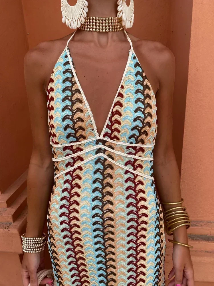 Blakelee - Chevron halter maxi dress with waist tie in blue and white pattern, featuring a flattering halter neckline and a…