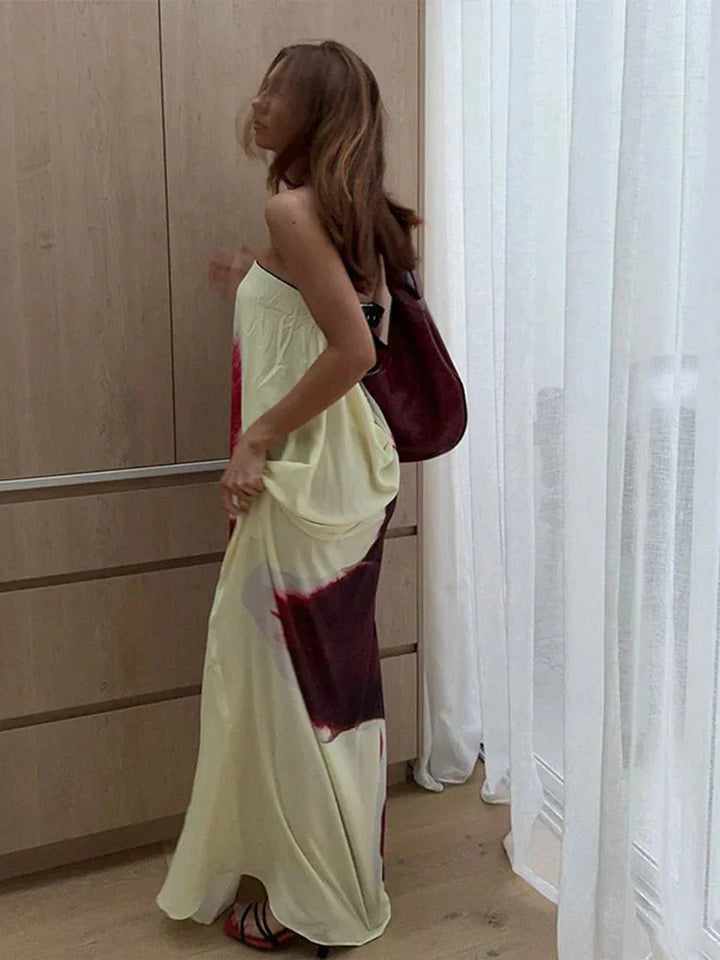 Alexi maxi dress in beach-ready floral print with lightweight fabric; perfect for summer styling.'