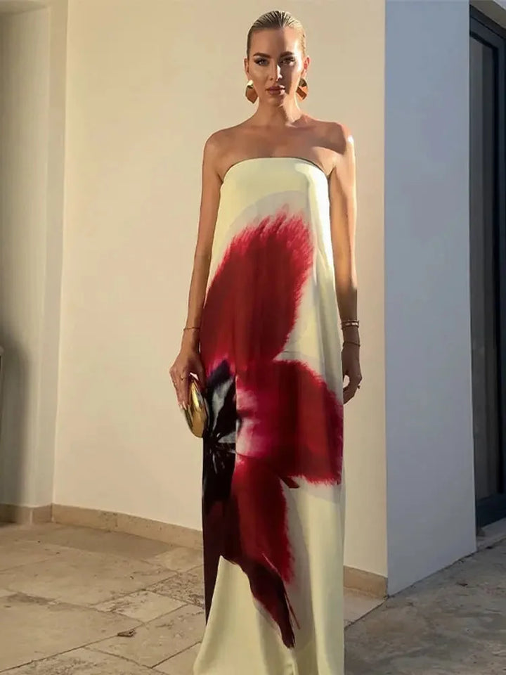 Yellow red floral print maxi dress made of lightweight cotton blend fabric, perfect for a casual beach day outfit.