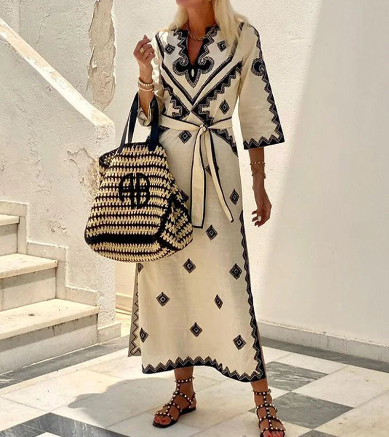 Beige printed maxi kaftan with a belt, featuring a relaxed fit and intricate design perfect for casual outings or beachwear.